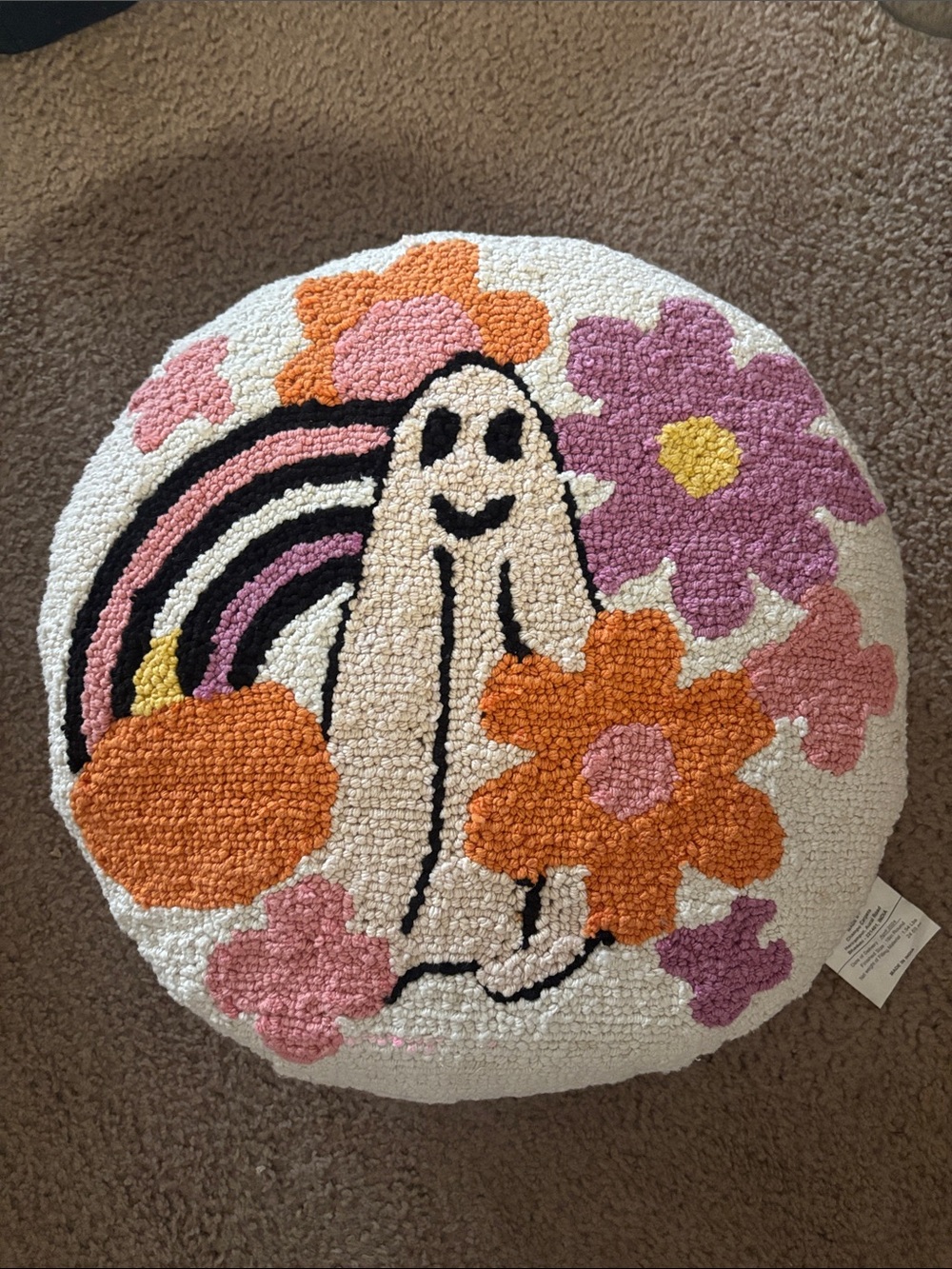 cupcakes & cashmere Round Hooked Pillow in Cream, Orange, Pink, Purple, Black